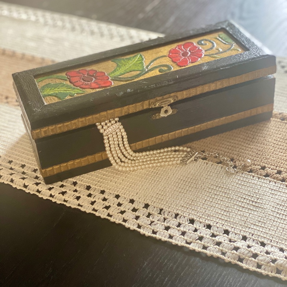 Antique Black and Gold Hand Carved Box with Floral Design